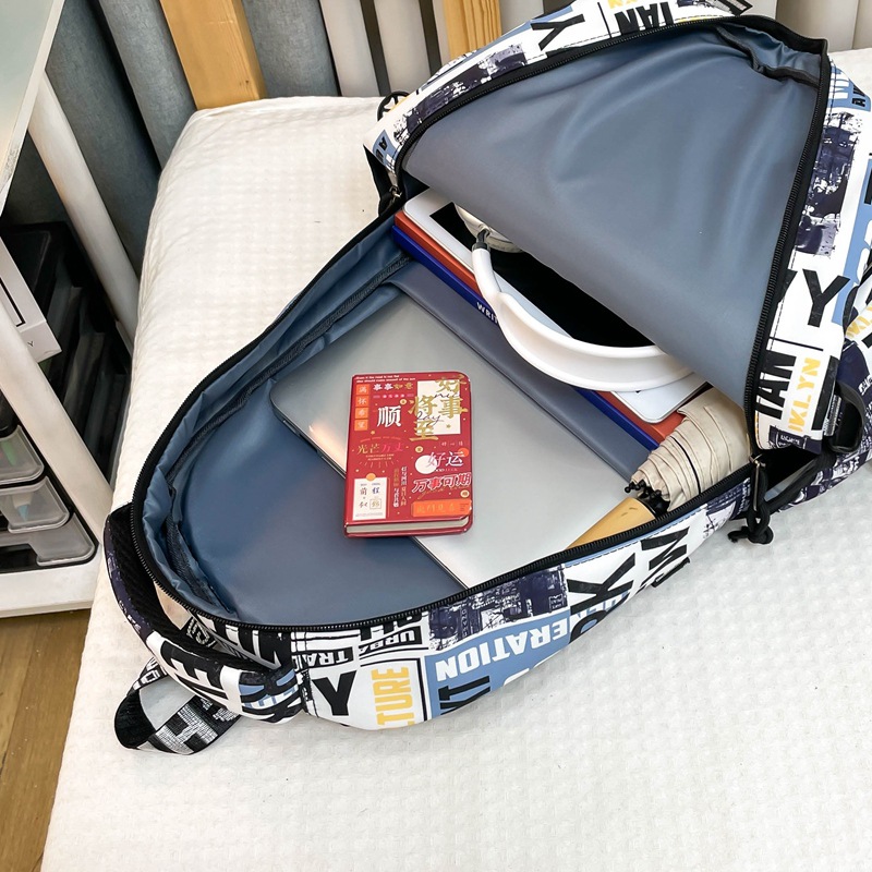 "Men's 2025 New style personalized graffiti middle school backpack, Japanese trendy brand college student couple travel backpack. Application Scenario