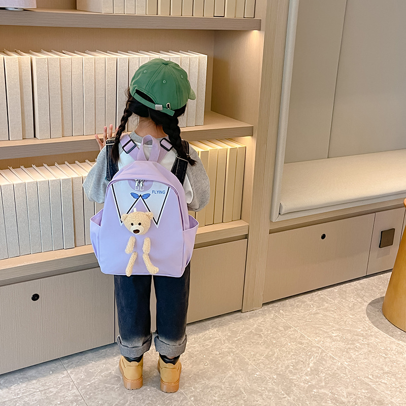 Fashionable backpack, simple children's schoolbag, super cute for boys and girls, Festival bear cartoon and adorable backpack details Picture