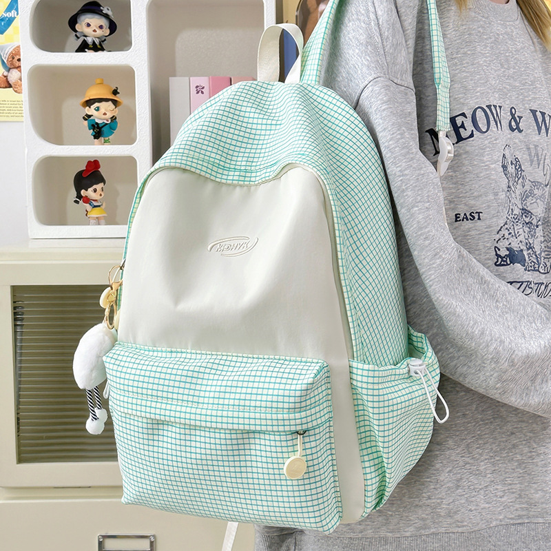 A new large-capacity multi-compartment versatile backpack for junior and senior high school students, featuring a forest-themed college style, is fresh, sweet and casual details Picture