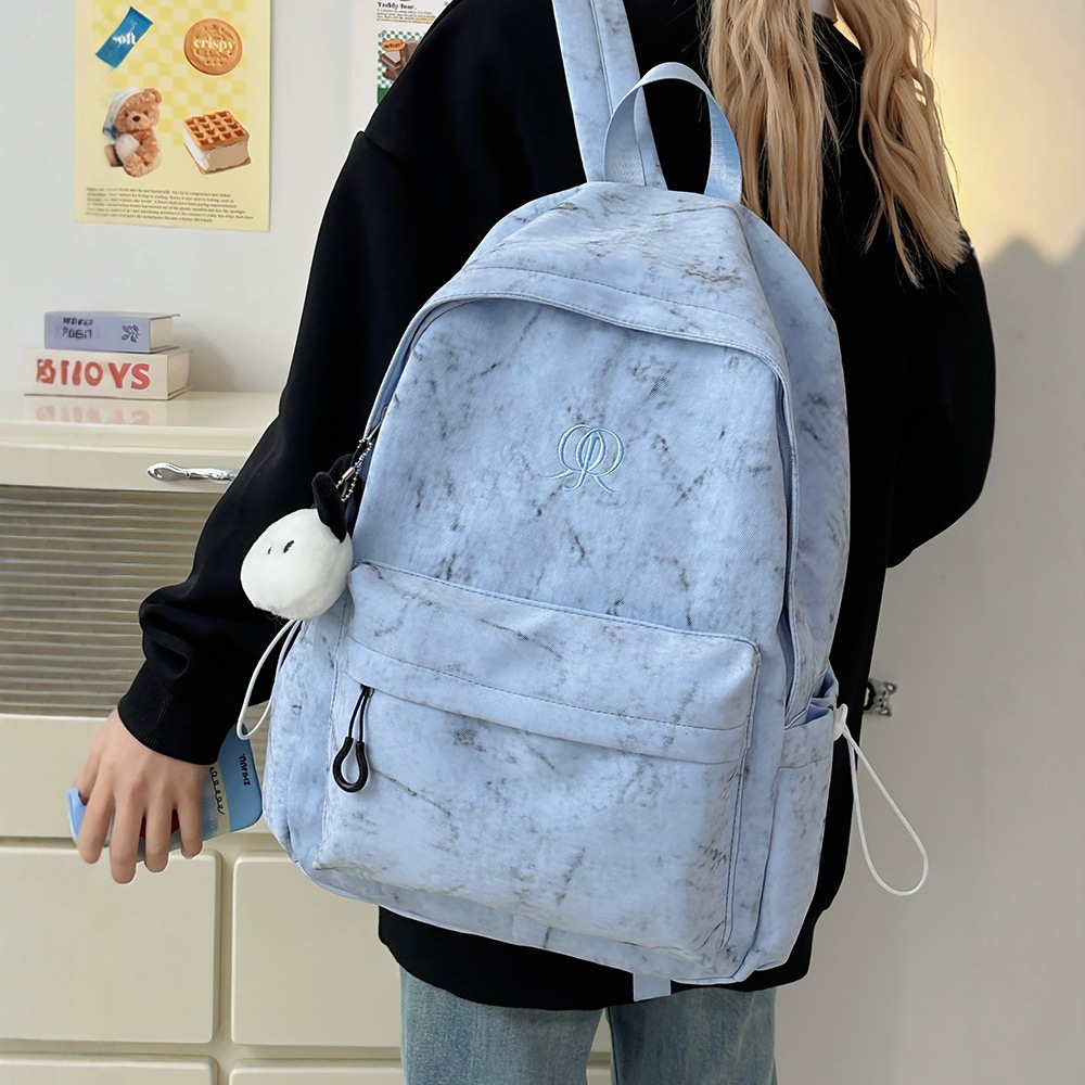 2025 New style of large-capacity, fashionable, solid-color, simple and versatile schoolbag for women on Instagram, a travel backpack for junior and senior high school students details Picture