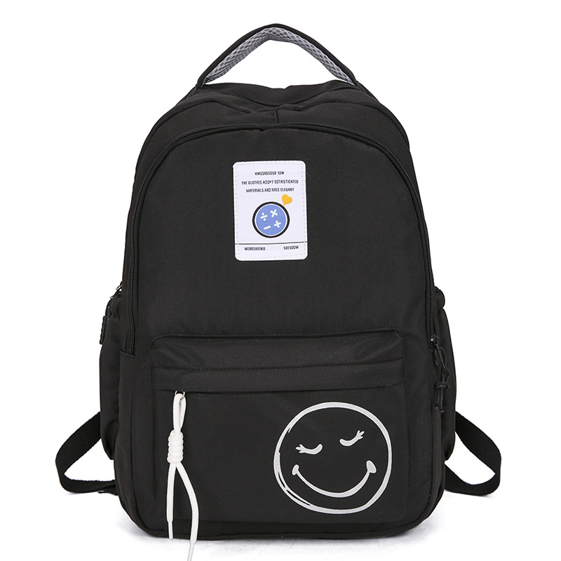 The 2024 new style of fashionable and simple backpacks for trendy boys and girls, large-capacity schoolbags for students, and cute smiling face printed backpacks Item Picture