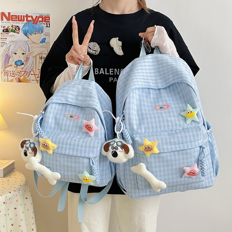 A new Japanese-style ins fresh, sweet and cute backpack for junior and senior high school students, featuring a simple and elegant design with a large capacity full figure