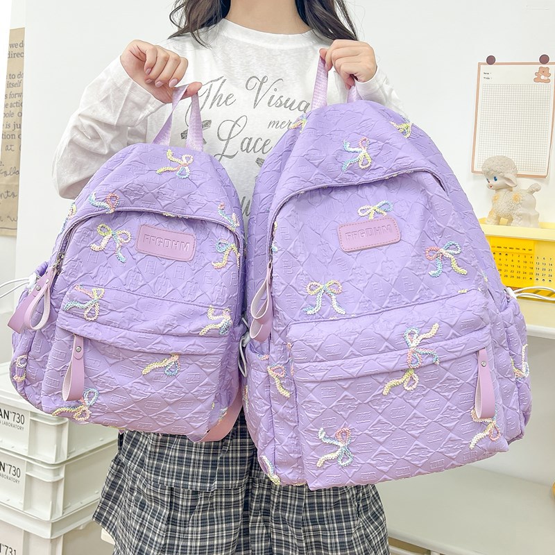 A new high-appeal, fresh and sweet candy-colored bow backpack from Japanese Instagram, a lightweight backpack for junior and senior high school students full figure