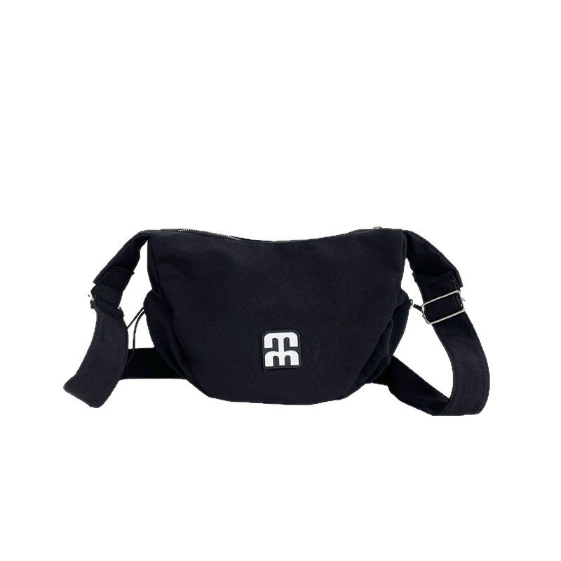 The new Japanese-style laid-back single-shoulder bag, large-capacity casual and cool canvas bag, simple, lightweight and versatile commuting dumplings Item Picture