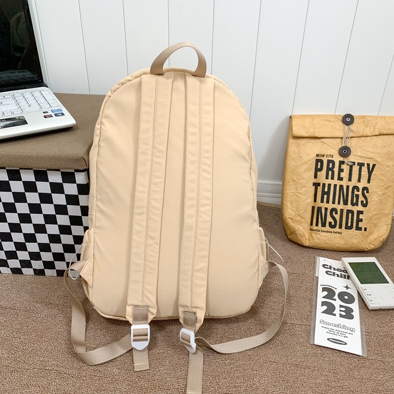 A new Korean-style laid-back schoolbag in a sweet solid color for junior and senior high school campuses, a fresh and versatile fashionable backpack Specification drawing