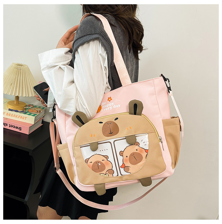 New 2025 large-capacity cartoon student tutorial bag with contrasting colors, cute single-shoulder bag, versatile for commuting, casual crossbody bag full figure