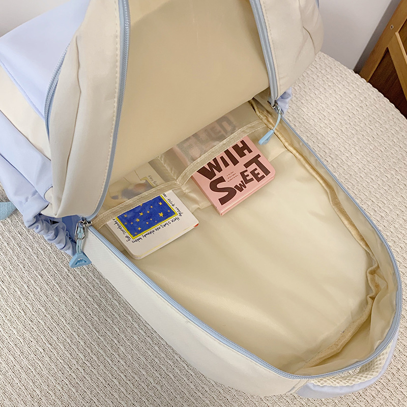 Versatile color-blocking backpack, new trendy large-capacity backpack, high-end short-distance travel bag, college student schoolbag Application Scenario