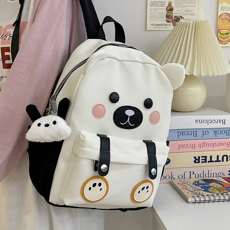 The new cartoon schoolbag is cute and adorable. It's a small backpack for children's travel, with a unique and creative design. It's a soft and cute backpack for girls' travel details Picture