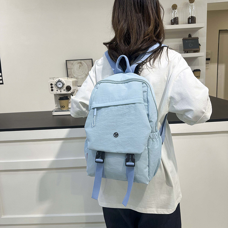 A new, simple and versatile backpack with a large capacity, unique and niche schoolbag. It is water-resistant and lightweight for spring outings and travel details Picture