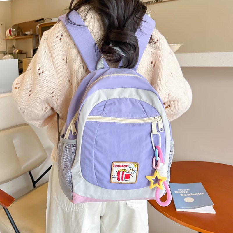 This is a new cute Korean-style children's study backpack for summer. It's a cute ice cream color-matched soft girl travel backpack full figure