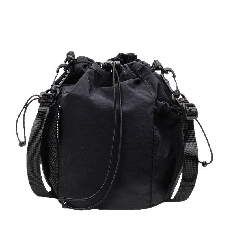 Simple solid color casual and versatile, lightweight and versatile, single-shoulder underarm bag with drawstring closure, portable large capacity bucket bag for women Item Picture