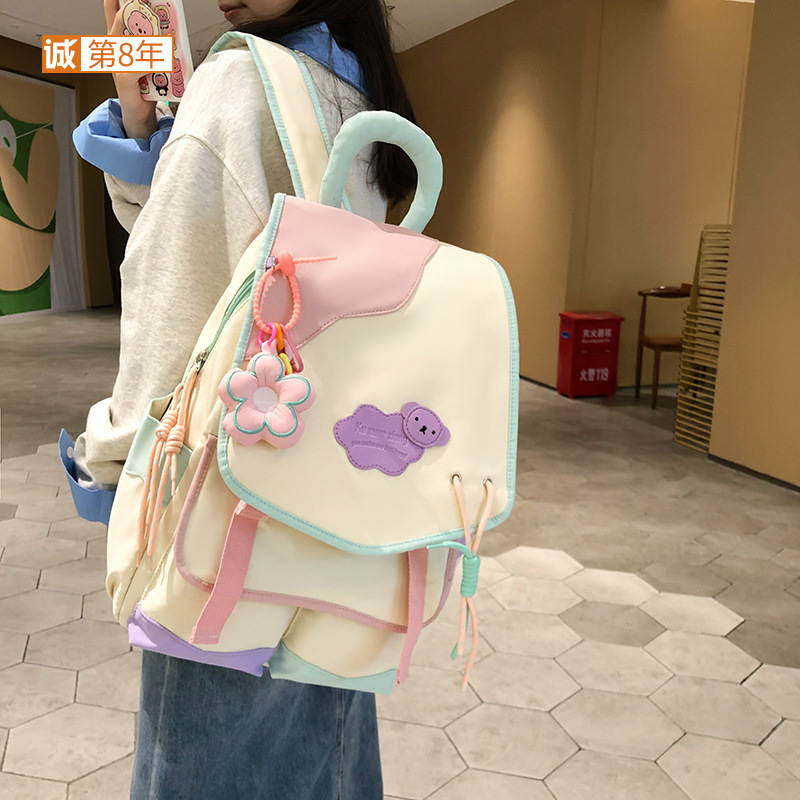 2023 New large-capacity backpack, cute backpack for junior and senior high school students, Korean-style color-blocking backpack for primary school students full figure