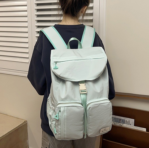 2025 New model backpack for female college students, large-capacity Korean style simple design schoolbag, men's casual travel backpack full figure