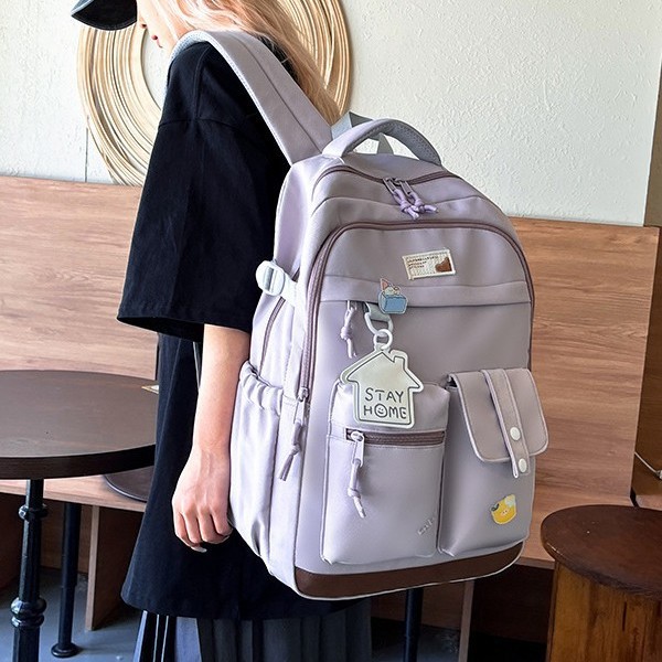 A new high-appearance-level Korean ins school style fresh and sweet backpack, a lightweight and large-capacity backpack for junior and senior high school students details Picture