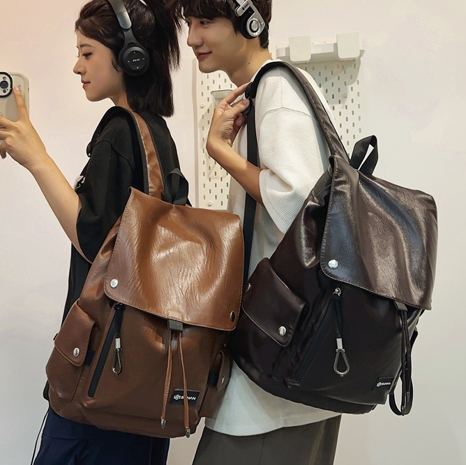 Men's 2024 new trendy and casual PU leather travel backpack, women's large-capacity computer student schoolbag full figure