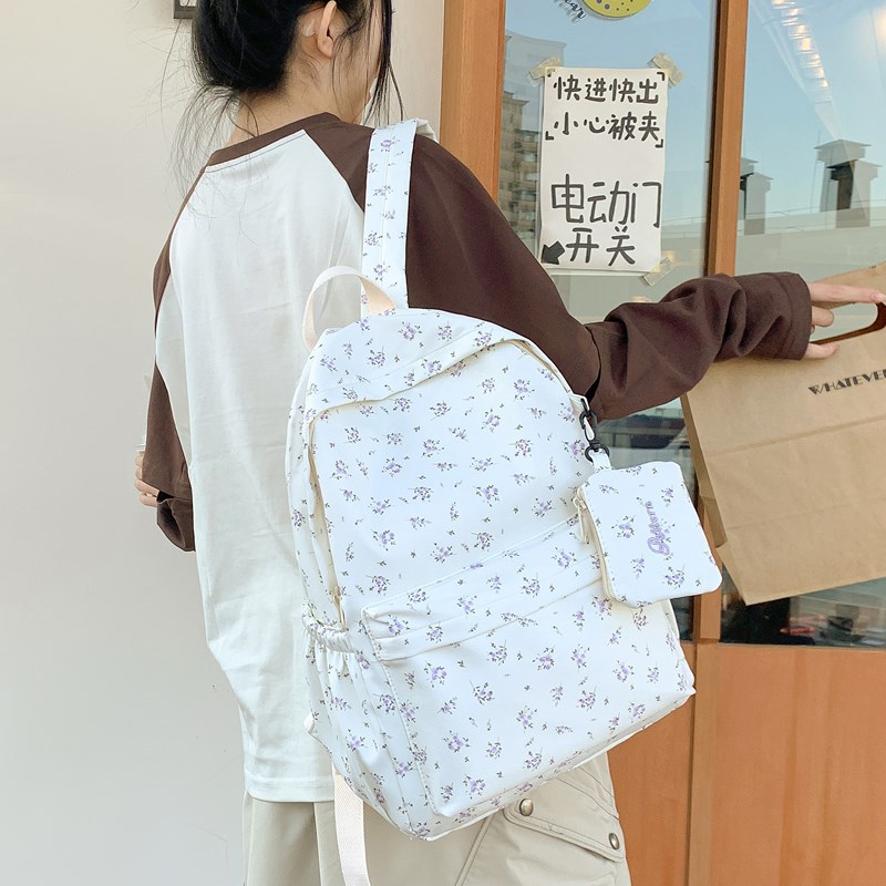 The new 2025 fresh and cute floral backpack is a simple, lightweight and versatile large-capacity backpack for high school and junior high school students, suitable for daily commuting details Picture