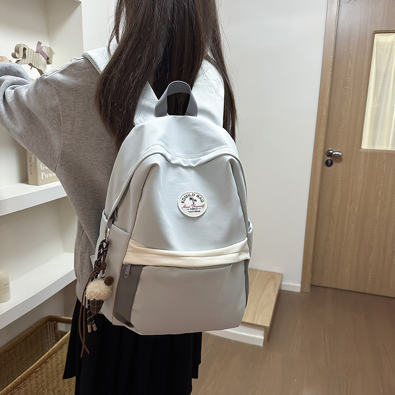 A simple and casual schoolbag with a school style for junior high school girls, a backpack for college students, and a light small schoolbag for commuting for girls details Picture