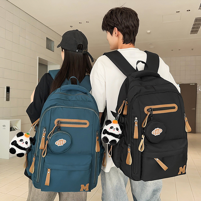 This is a large-capacity, durable backpack for junior and senior high school students. It is designed for a male college birthday, a casual travel backpack with spine protection full figure