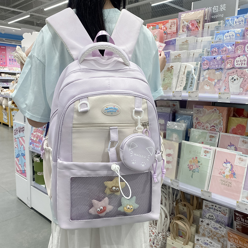 A new Japanese-style ins high-appearance-level college fresh and sweet candy-colored backpack with large capacity for primary and secondary school students full figure