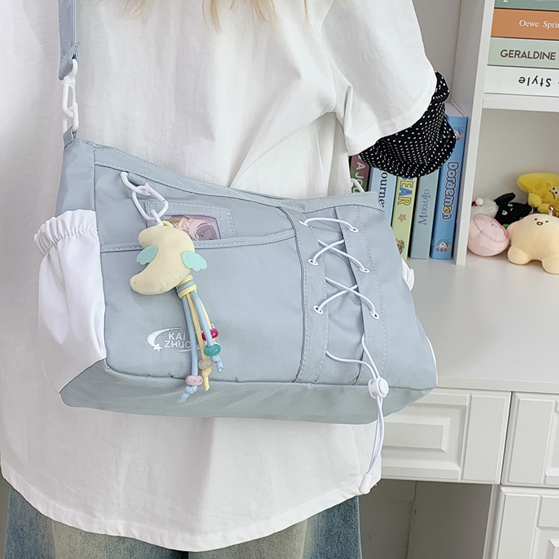 College-style versatile, simple and large-capacity postman schoolbag, women's clothing book, transparent shoulder bag, casual pain bag details Picture