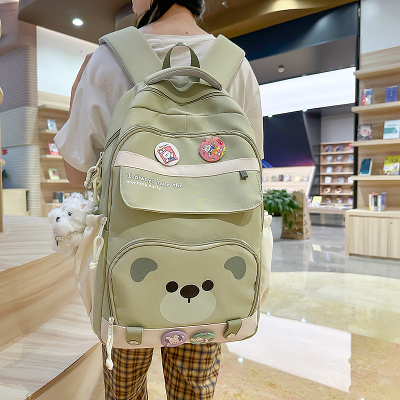A new high-appearance-level Harajuku fresh and sweet candy-colored bear backpack, a lightweight and large-capacity backpack for junior and senior high school students full figure