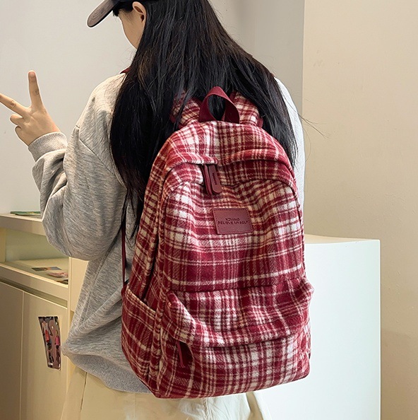 Korean version of ins school style woolen checkered schoolbag for girls, new spring 2025, high appearance level backpack for students full figure