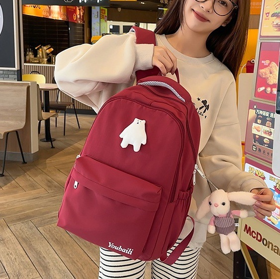 Solid-colored girls' backpacks, simple and lightweight schoolbags for junior high school students, cute little bears for girls, versatile backpacks for college students full figure