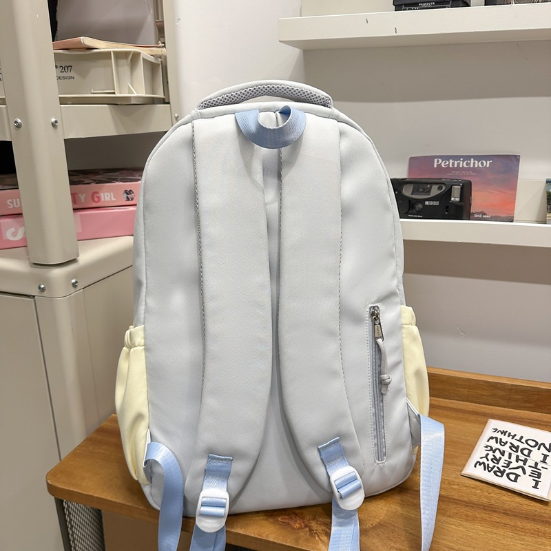 The new schoolbag is a large-capacity, lightweight backpack for junior and senior high school students with a Korean ins school style, contrasting colors and high appearance standards Specification drawing
