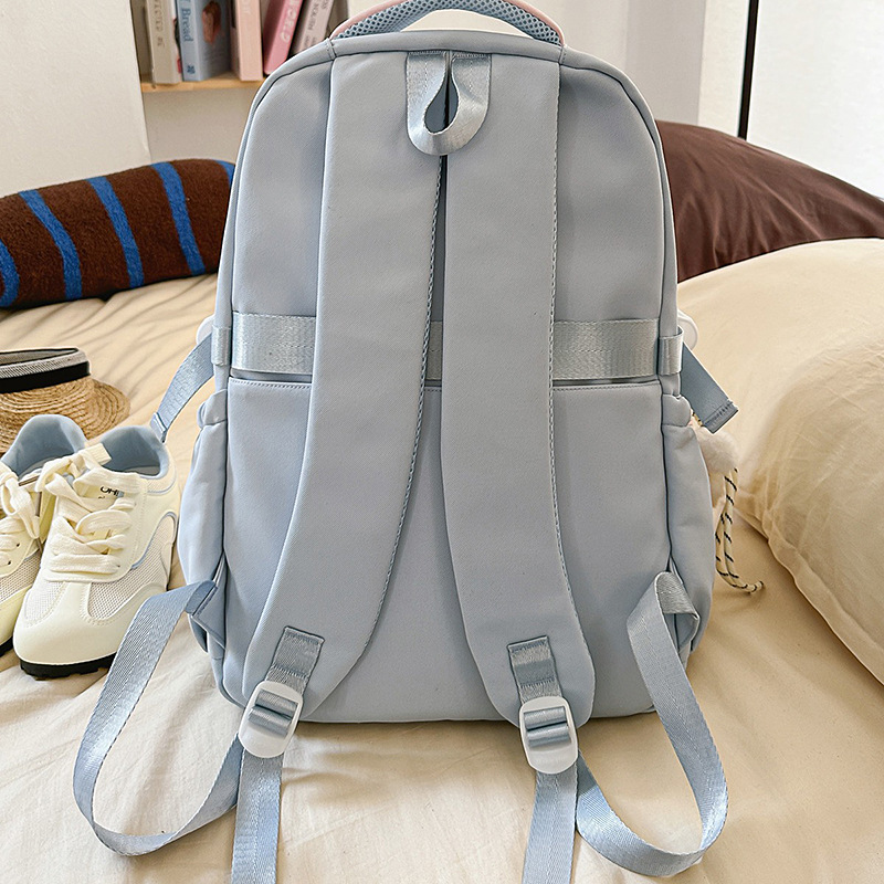 A new high-appeal Japanese-style ins fresh and sweet color-blocking backpack for junior and senior high school students, a casual and lightweight backpack Specification drawing