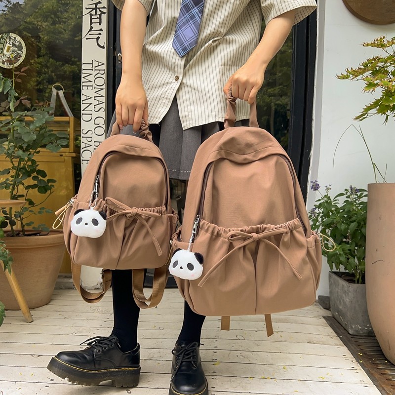 A new Korean-style, ins, niche design, lightweight, artistic, solid-color, large-capacity backpack for female college students full figure