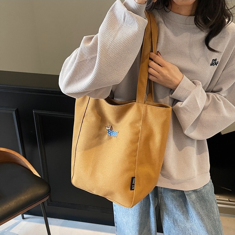 2025 New Korean InS-style simple canvas bag, large-capacity bucket bag, casual and versatile student single-shoulder bag details Picture