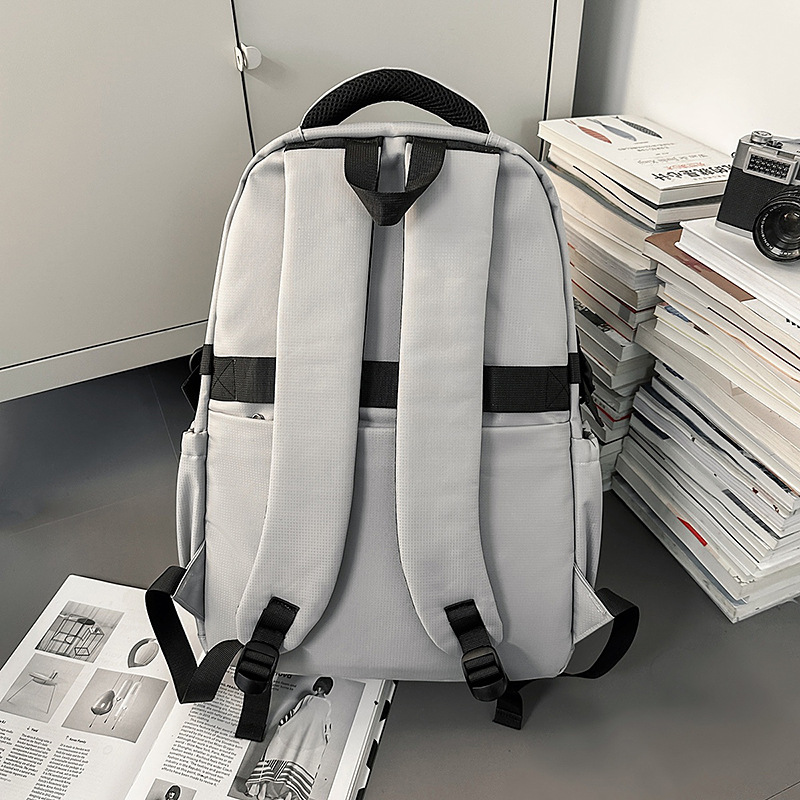 The new Korean-style Instagram trendy letter print backpack from the "Schoolbag Man" is casual, simple, lightweight and has a large capacity Specification drawing