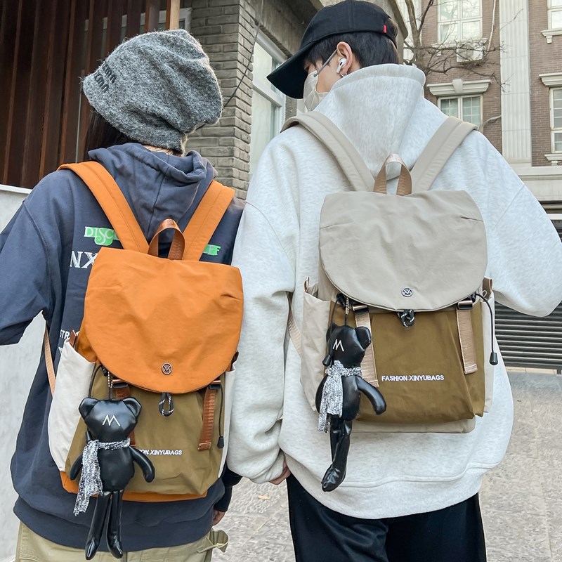 A new high-appearancelevel college style color-blocking backpack for junior and senior high school students, which is casual, simple, lightweight, versatile and has a large capacity details Picture
