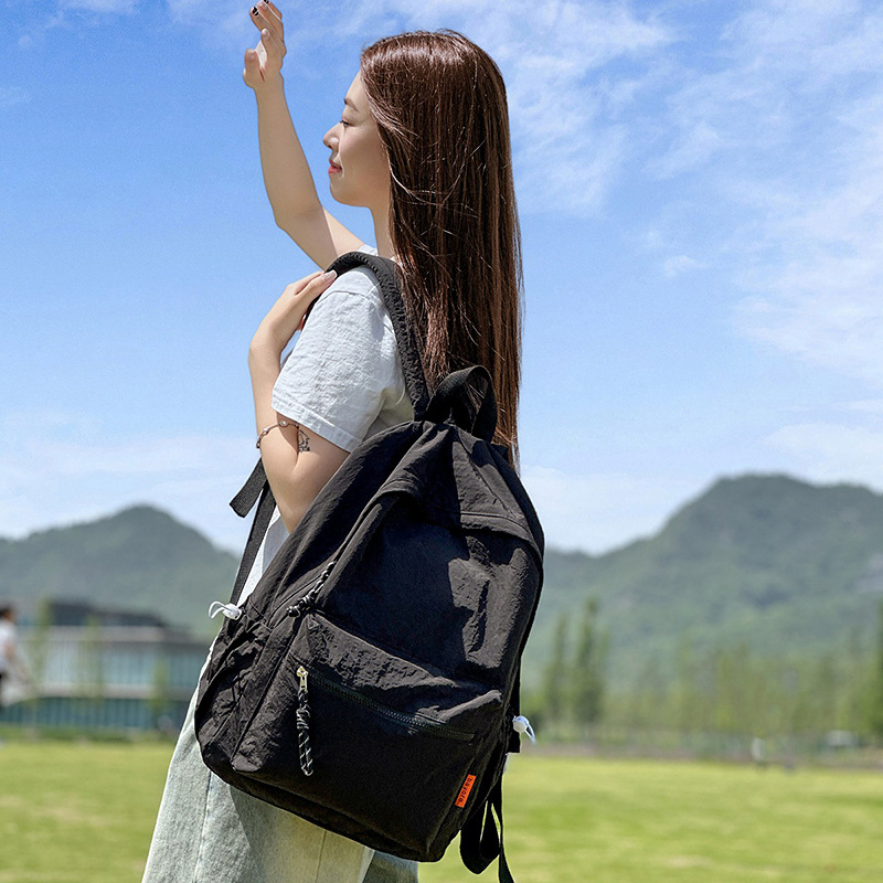 Solid-color high-end backpack for women, simple and elegant college student schoolbag, lightweight high school student, large-capacity couple travel backpack details Picture