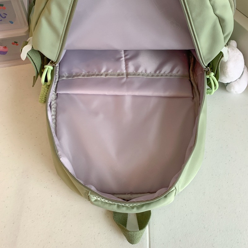Japanese-style ins backpack with a large capacity and multiple compartments, lightweight middle school backpack and college student travel backpack Application Scenario