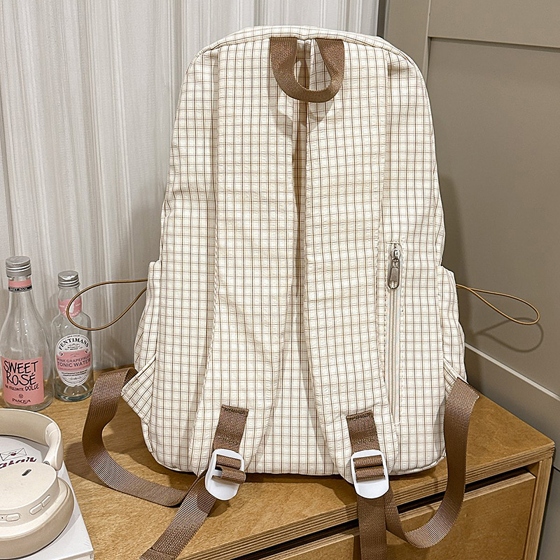 A new Korean-style ins backpack with a high level of appearance, fresh and sweet, student casual and simple striped large-capacity backpack Specification drawing