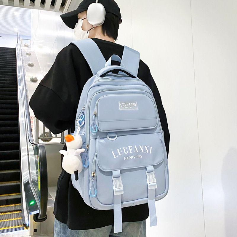 A new Korean style Instagram trendy couple's casual travel backpack with multiple compartments for primary and secondary school students details Picture