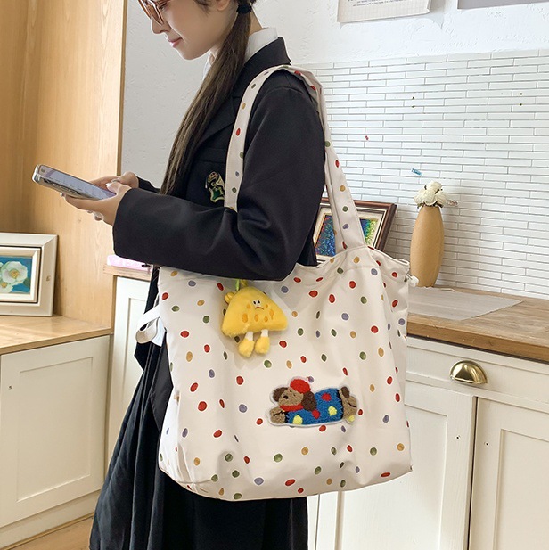 The 2024 new style of Korean cute puppy girl underarm bag with high appearance level polka dot single-shoulder bag and versatile commuter tote bag full figure
