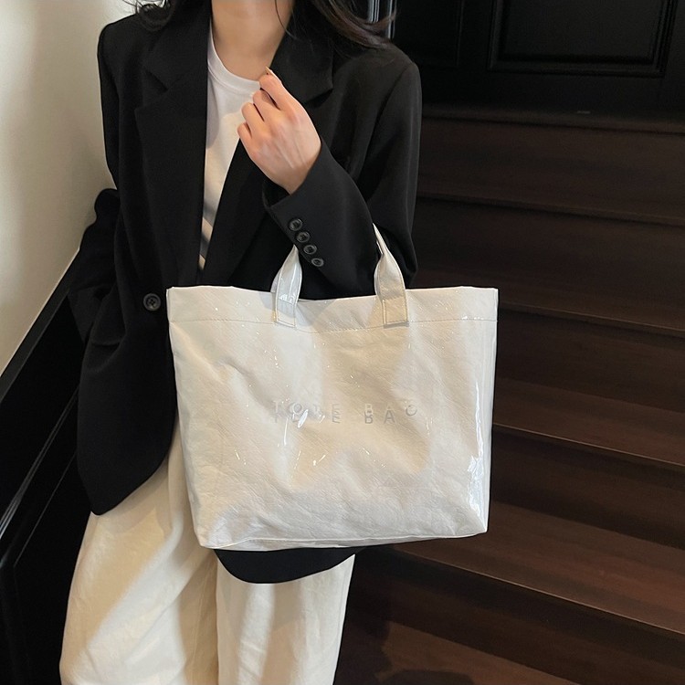 A versatile large-capacity DuPont paper bag 2025 new style fashionable transparent PVC waterproof tote bag for commuting details Picture