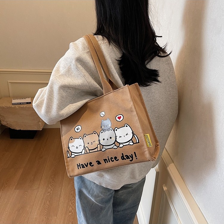2025 New cute cat large-capacity student book tutorial bag, fashionable and casual single-shoulder bag, commuting handbag full figure