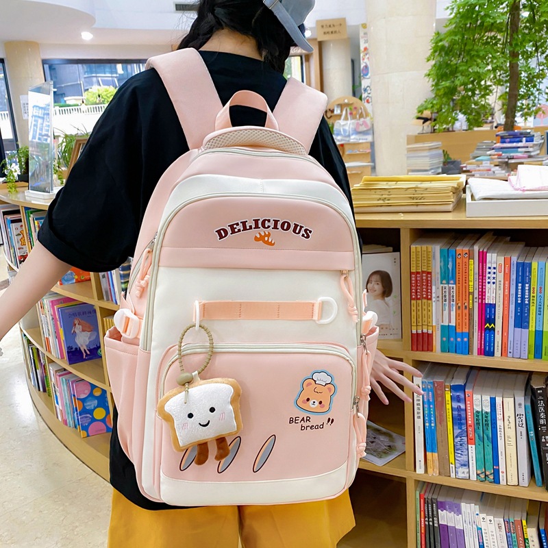 A new Japanese-style Instagram backpack with a high level of appearance, featuring a fresh and sweet school style and color-blocking patchwork. It is a backpack for junior and senior high school students full figure