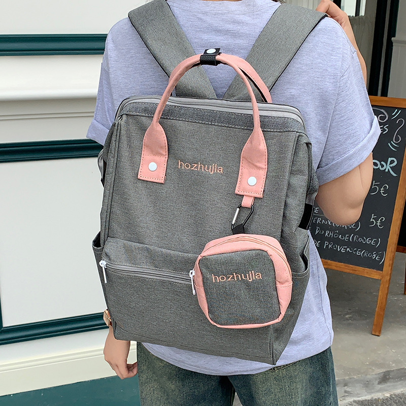 2025 New large-capacity, versatile, niche schoolbag, casual and lightweight mommy bag, high appearance level, color-blocking and simple backpack full figure