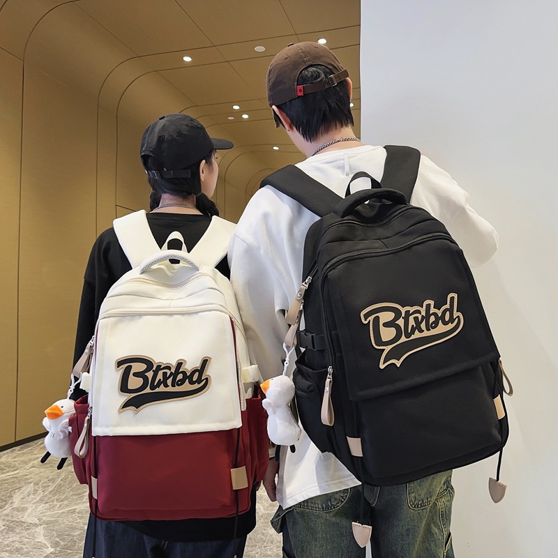 A new Korean-style high-appearance-level letter-style backpack for boys and girls, casual, simple, lightweight and versatile for commuting full figure