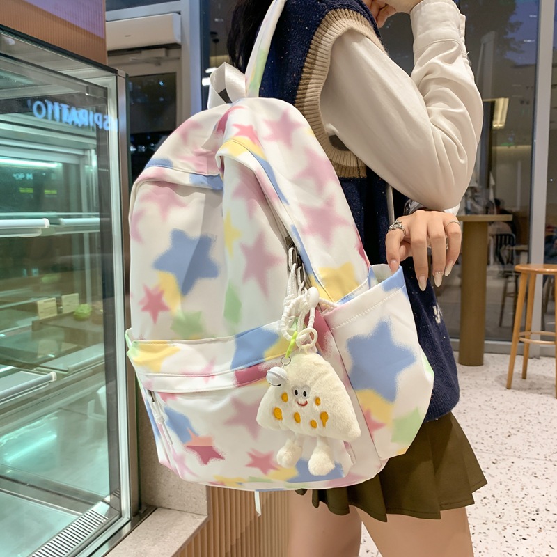 The 2024 spring new cute star-shaped backpack is in an ins style with a high level of appearance. It's a sweet backpack for junior and senior high school girls full figure
