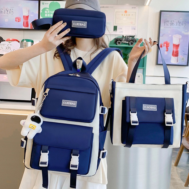 Wholesale of new three-piece schoolbags for middle school students, fashionable single-shoulder hand-carry tutorial bags and casual backpacks full figure