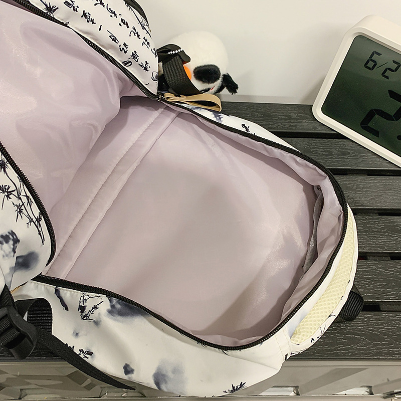 New schoolbag with Chinese trend tie-dye, high appearance level, couple casual backpack, high-quality air-cushioned backpack for teenagers and students Application Scenario