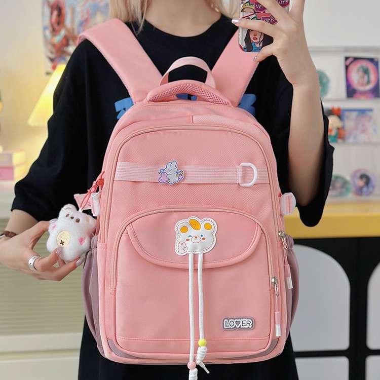 New lightweight schoolbag for primary and secondary school students, cartoon bear, large-capacity backpack, high appearance level campus backpack wholesale full figure