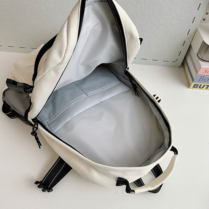 New female schoolbag, Korean version, large-capacity, simple backpack for junior and senior high school students, trendy brand, casual single-shoulder bag for college students Application Scenario