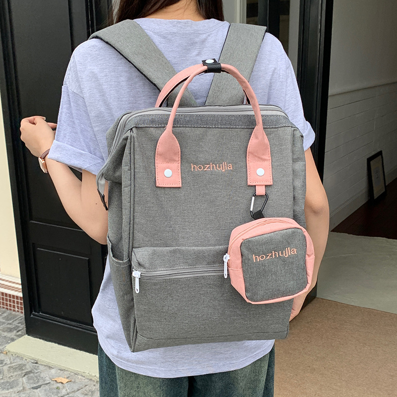 2025 New large-capacity, versatile, niche schoolbag, casual and lightweight mommy bag, high appearance level, color-blocking and simple backpack details Picture
