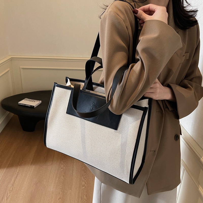 Large-capacity casual canvas bag for women, 2024 new style fashionable hand-held commuting bag, simple and versatile office tote bag details Picture